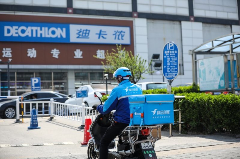 Delivery driver outside China Decathlon store