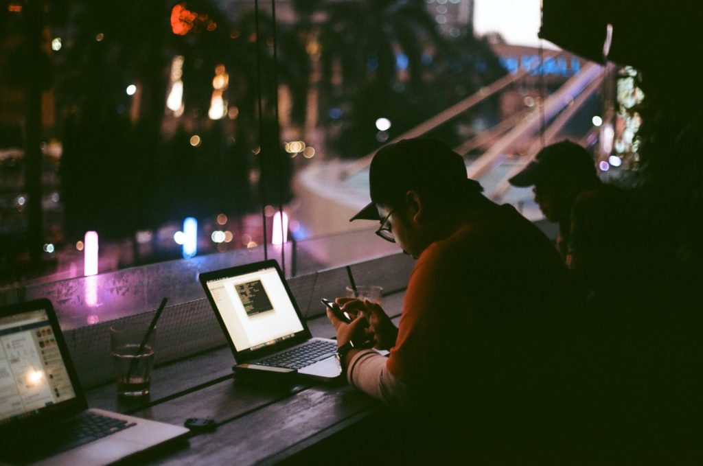 Person working in front of a laptop