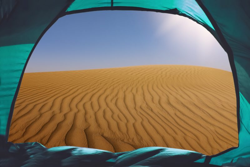 Camping in desert. Credit: adobe Stock
