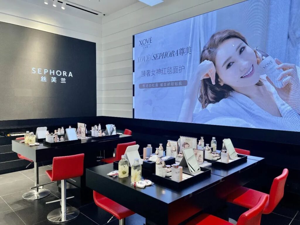 FILE--Pedestrians walk past a store of Sephora in Shanghai, China