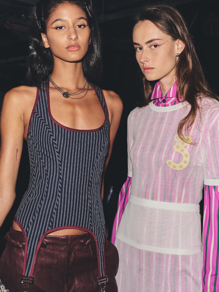 Mithridate SS27 look in a color palette drawn from film about 1980s London club culture rather than archival photography.