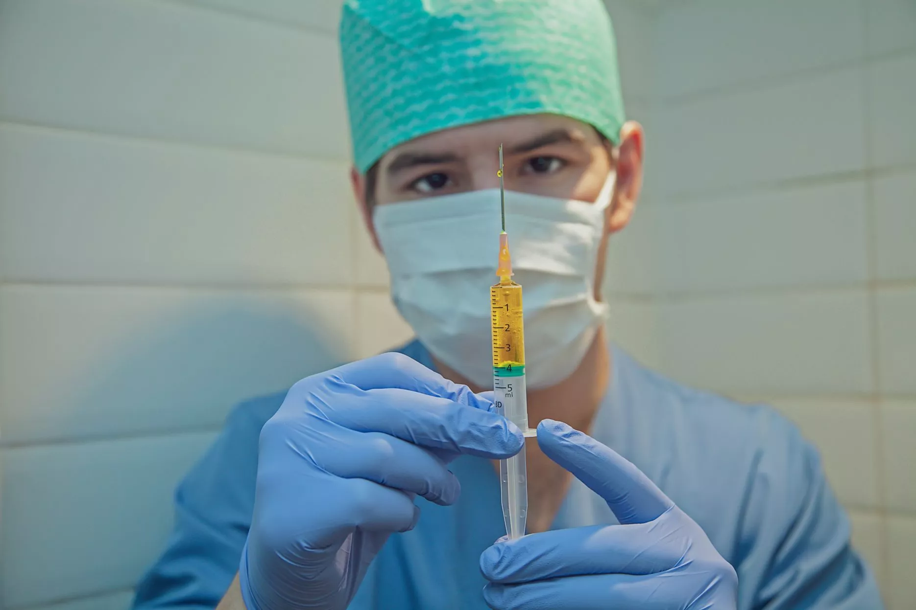 Doctor with syringe