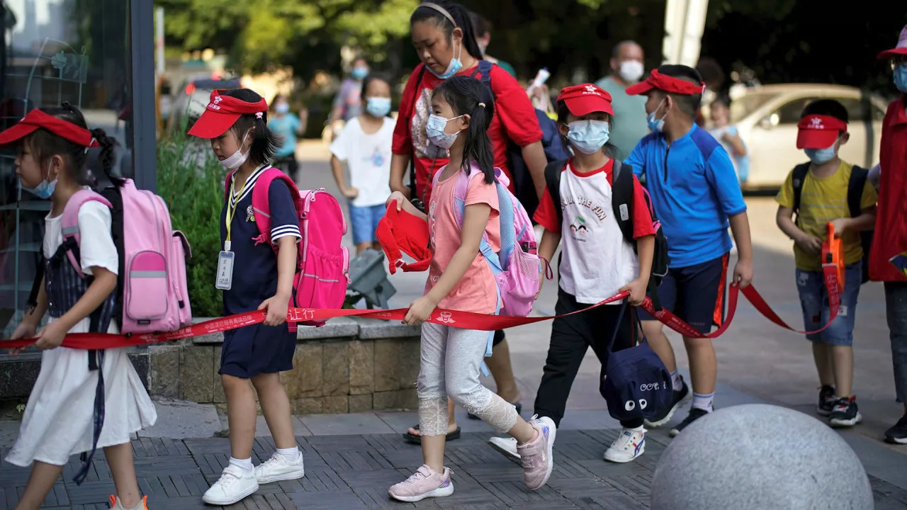 China's students return to school